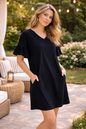 Vestido jersey corte holgado con bolsillos